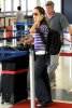 IMG/jpg/eliza-dushku-departs-LAX-airport-paparazzi-gq-03.jpg